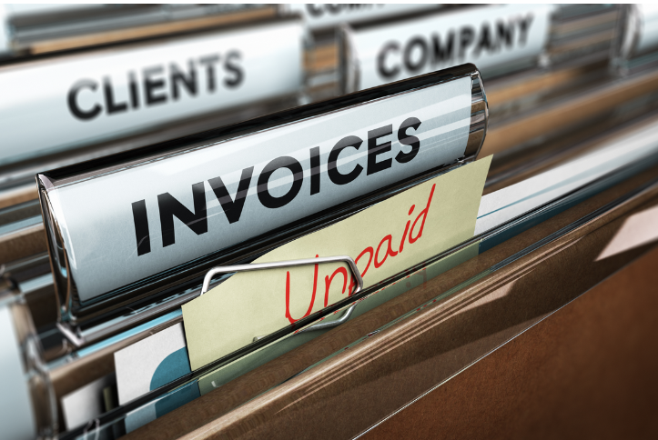 Unpaid invoices in filing cabinet