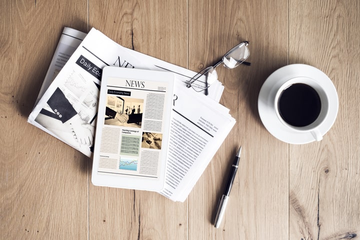 Newspaper on table